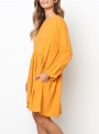 yellow-round-neck-long-sleeve-high-low-loose-pleated-mini-dress-with-pockets